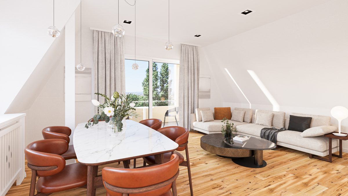 Offener Wohn- und Essbereich einer Maisonette unter dem Dach